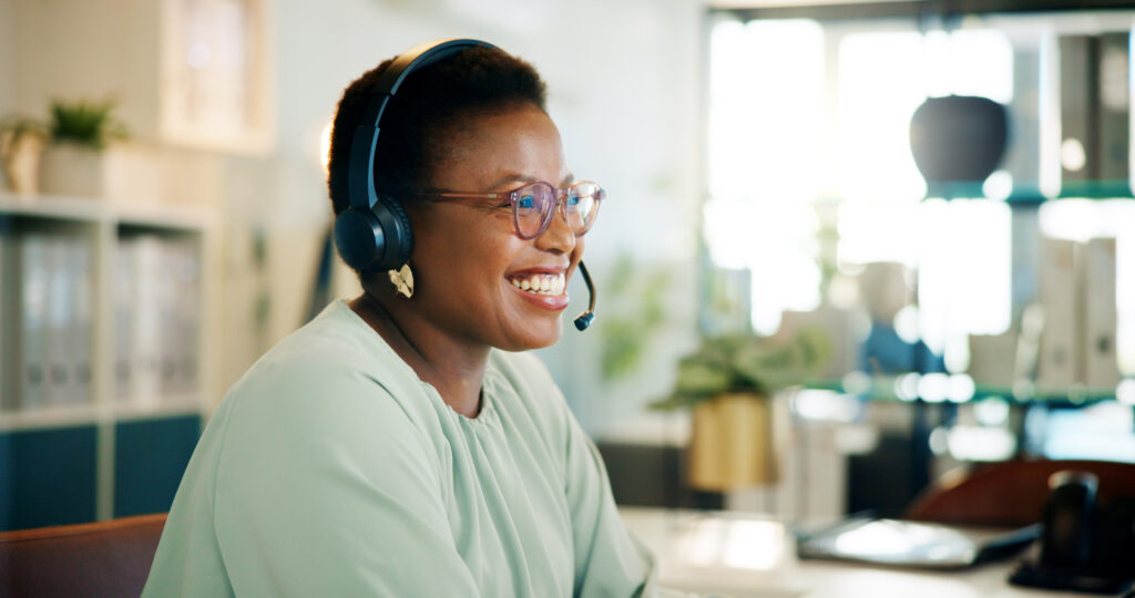 Friendly admissions specialist at an addiction treatment center offering compassionate support to incoming clients.