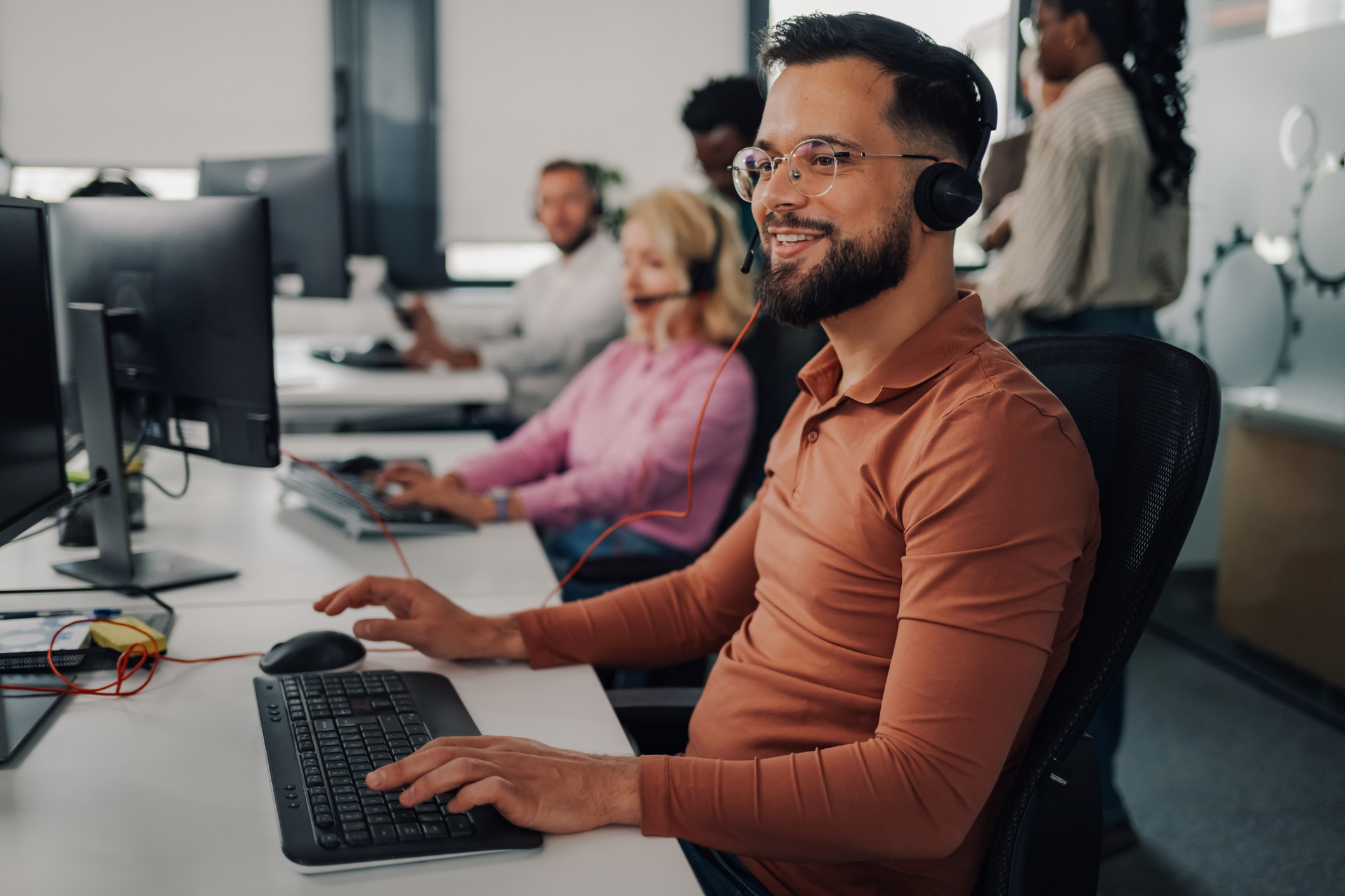 Man on admissions team at an addiction treatment center reviewing paid ads performance to improve lead quality and conversions.