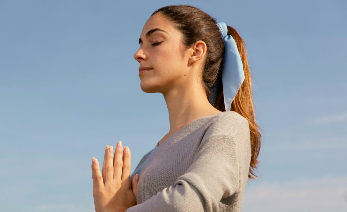 woman doing pray pose