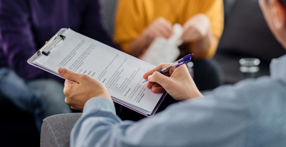 a man taking notes about digital marketing services in Boynton Beach​