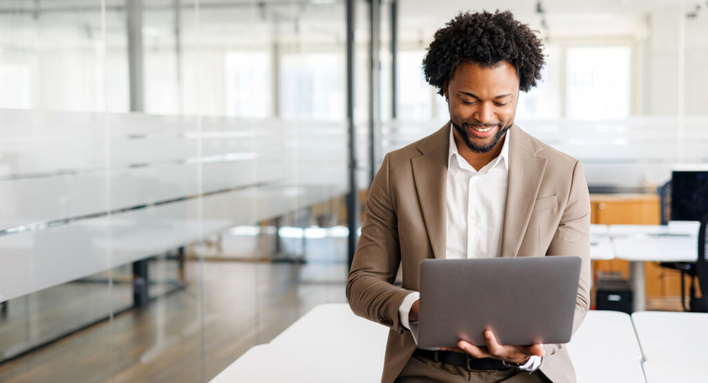 Team reviewing digital marketing performance data to compare demand gen and lead gen strategies for behavioral health admissions growth.